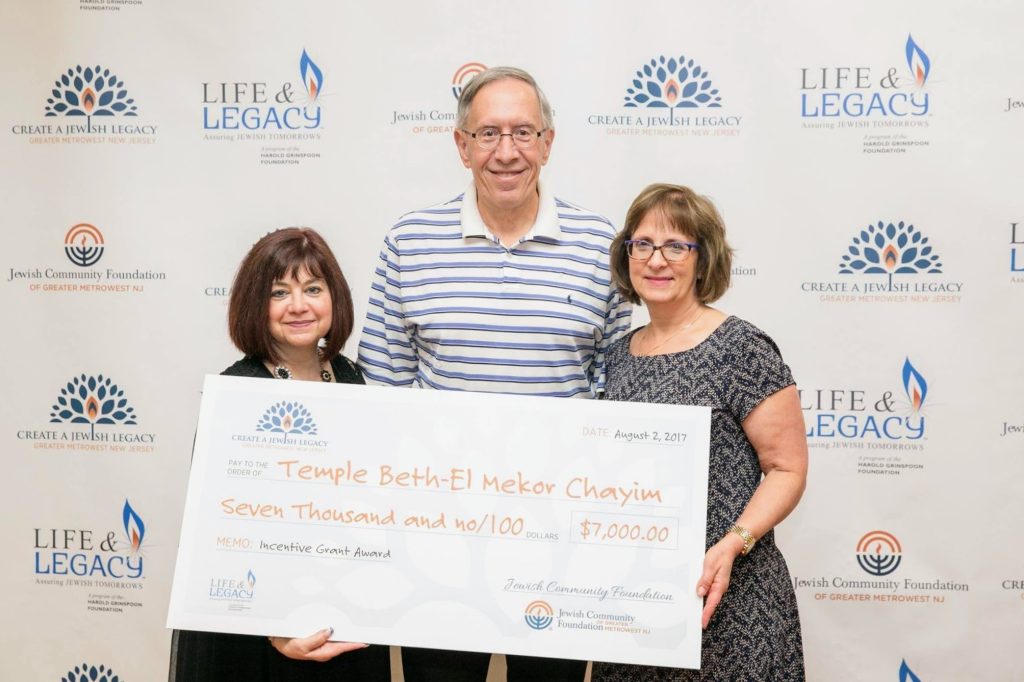 TBEMC receives grant check for meeting legacy goals for 2017